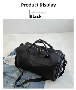 Top view of large black waterproof sports bag with reinforced handles and shoulder strap