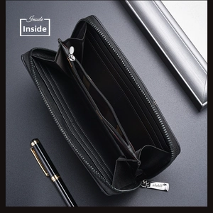 Detailed view of the multi-card slots and zippered coin pocket in a black leather wallet