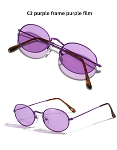 Vista macro detallada de gafas de metal morado con lentes moradas y el código de modelo C3 de cerca
