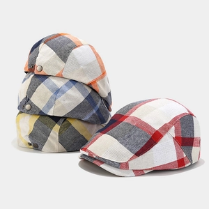 Classic British plaid beret hats in assorted colors with metal snap button detailing