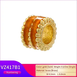 Gold plated brass barrel bead with orange enamel inlay 4x6mm for jewelry making
