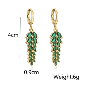 Detail view of 18K gold plated zircon earrings with green marquise stones, 4cm length