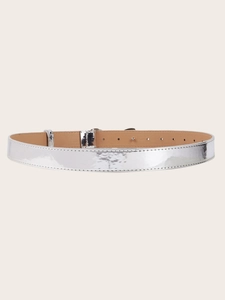 Close-up of metallic silver bow buckle belt with khaki inner lining for jeans
