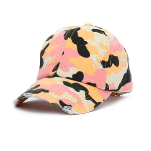 Detailed close-up of distressed edges and camouflage pattern on the ponytail baseball cap