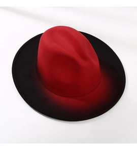 Overhead view of red and black gradient wool felt fedora hat with a classic wide brim