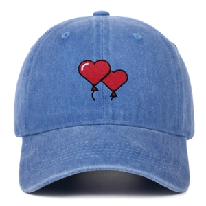 Washed blue denim baseball cap with red heart balloon embroidery on the front