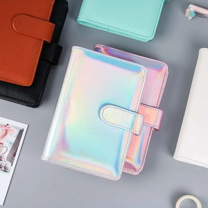 Detail of the colorful laser PU leather binder notebook with fine stitching and textures