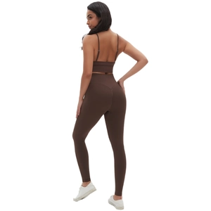 Two-piece chocolate brown seamless yoga set with sports bra and high-waisted leggings