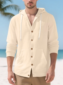 Detailed texture of men's cotton linen hooded shirt with wood buttons and drawstring