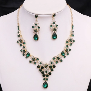 Elegant bridal jewelry set with emerald green waterdrop crystals and gold necklace