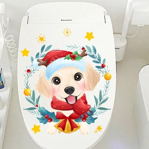Detailed view of a Christmas puppy toilet lid sticker with festive wreath and stars