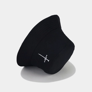 Fashionable black cotton bucket hat with white cross sword embroidery on a grey background