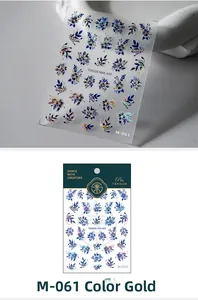 Detailed view of M-061 laser blue floral nail art stickers with metallic gold edges