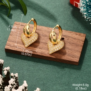 Detailed size view of sparkling bow heart earrings featuring dimensions and weight labels
