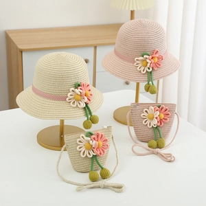 Kids sweet straw hat and matching flower bag set for sun protection in summer