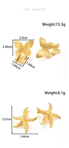 Detailed tile display of gold butterfly and starfish earrings with size and weight measurements