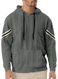 Detail of men's cable knit hoodie showing grey textured fabric and striped sleeve stitching
