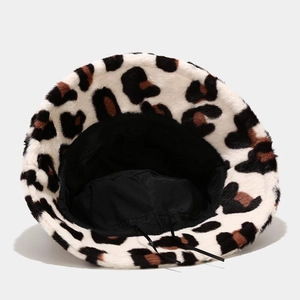 Detail of leopard plush bucket hat showing black inner lining and adjustable drawstring
