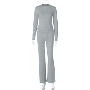 Detail view of grey long sleeve top and flared pants set with fine knitted texture