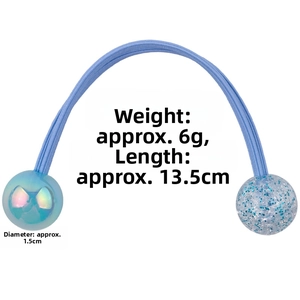 Detail view of light blue elastic hair tie with 1.5cm pearlescent and glitter beads