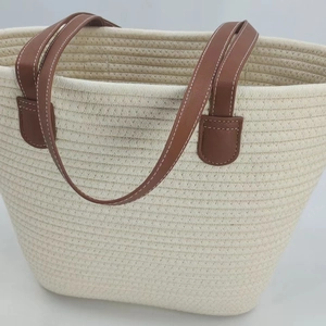 Large capacity beige woven cotton rope tote bag with brown leather handles