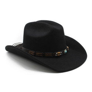 Detail of black wool cowboy hat with leather band and turquoise bead embellishments