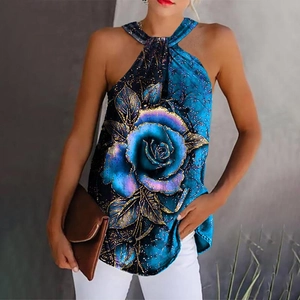 Detail of blue rose floral print on a summer halter top with vibrant fabric texture