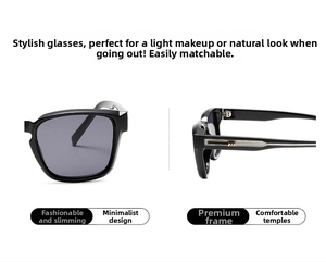 Close-up of black square sunglasses with metal stripe details on temples