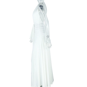Detail of elegant waist ruching and side drape on a white halter backless maxi dress