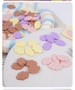 Macro shot of 2cm mini resin cloud charms for DIY slime and phone case decoration