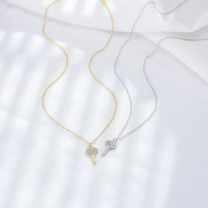 Elegant 925 sterling silver key pendant necklace with zircon pavé in gold and silver
