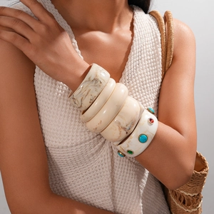 Set of five retro thick resin bangles with marble texture and colorful stones for women