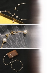 Macro detail of 18K gold plated hoop earrings with handmade natural freshwater pearls