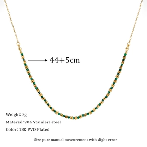 Detail of beaded necklace featuring green stones and 18K PVD gold plated stainless steel
