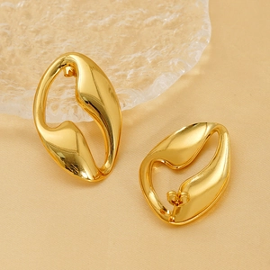Golden irregular geometric cutout stainless steel earrings with a polished fluid design