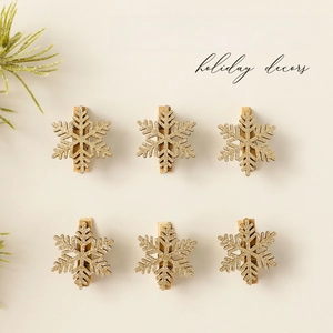 Set of 6 gold glitter wooden snowflake clips for Christmas holiday decorations