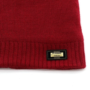 Deep red knit winter beanie with fleece lining and Classic Fashion label for outdoor sports