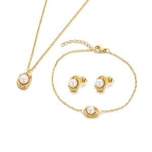Lava metal jewelry set with white pearls including gold necklace bracelet and earrings