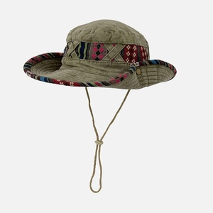 Close-up of olive green outdoor sun hat with ethnic embroidery and adjustable cord