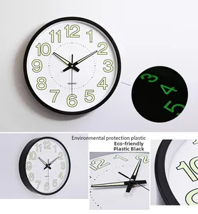 Detail view of 12-inch plastic wall clock featuring luminous numerals and quartz movement
