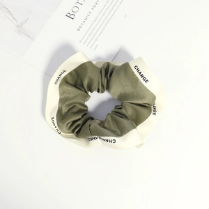 French style olive green and beige satin scrunchie with CHANGE letter print