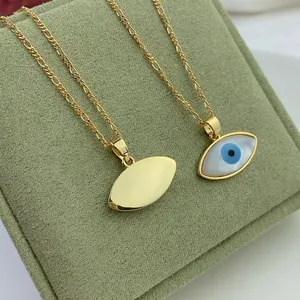 Oval Mother of Pearl Evil Eye necklace with golden Figaro chain showing front and back