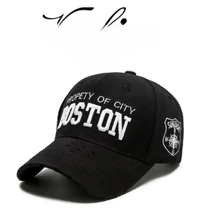 Macro detail of Boston embroidery and distressed brim on black vintage baseball cap