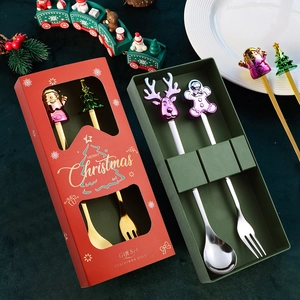 Christmas themed stainless steel cutlery gift set with Santa and reindeer cartoon charms