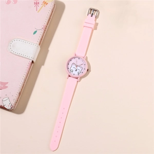 Close-up of pink silicone watch dial featuring cute cat design and clear numeric scale