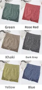 Selection of seamless high-waist yoga shorts in six vibrant colors with moisture-wicking fabric