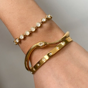 Set of three 18k gold plated stainless steel snake and star pattern bracelets with crystals