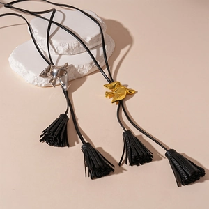 Adjustable black leather tassel necklace with gold and silver bird metal charms
