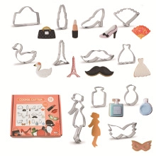 Matrix layout of 12-piece stainless steel cookie cutters in fashion-themed shapes