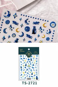 Detailed macro view of 3D embossed Starry Night nail art stickers with gold star patterns